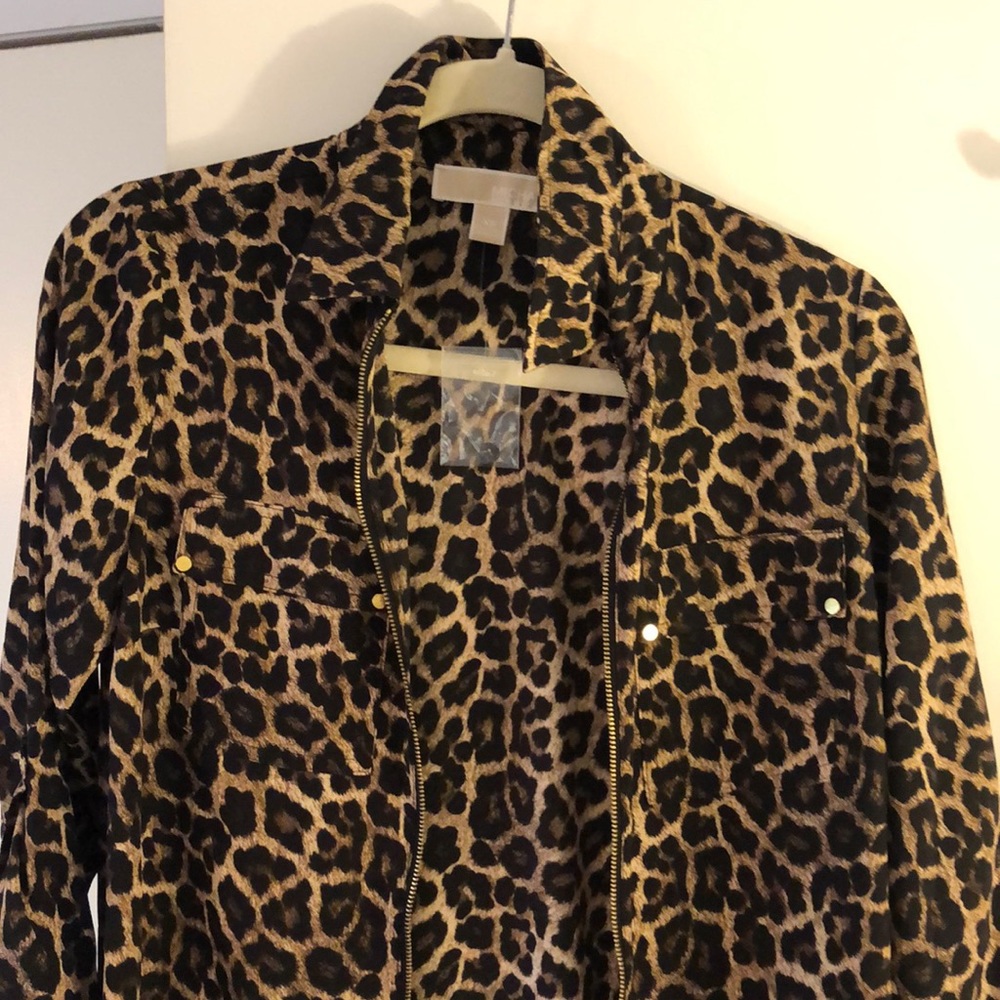 Michael Kors leopard print blouse.  Long sleeves, zipper and pockets.